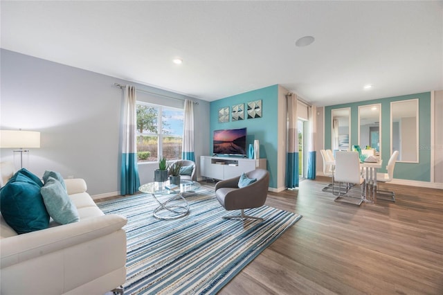 1902 Walnut Creek Dr, Kissimmee, FL 34744 - living area featuring wood finished floors and recessed lighting