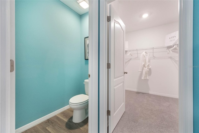 1902 Walnut Creek Dr, Kissimmee, FL 34744 - bathroom featuring toilet and a spacious closet