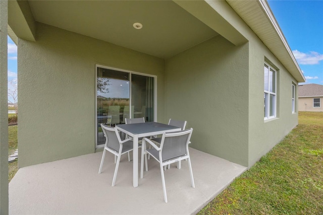 1902 Walnut Creek Dr, Kissimmee, FL 34744 - view of patio / terrace featuring outdoor dining area