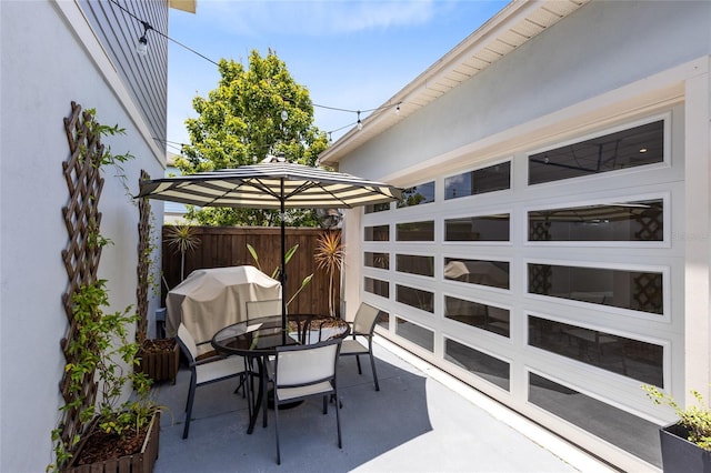 8290 Nemours Pkwy, Orlando, FL 32827 - view of patio featuring outdoor dining area and grilling area