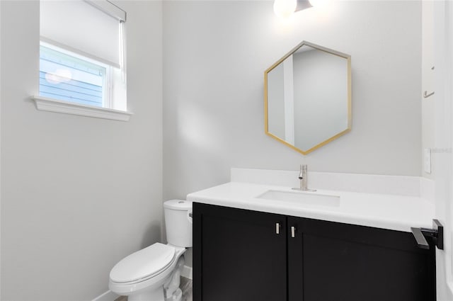 8290 Nemours Pkwy, Orlando, FL 32827 - half bathroom featuring vanity and toilet