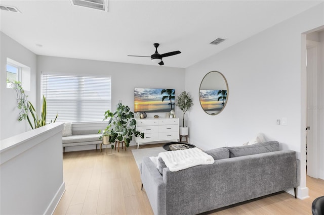8290 Nemours Pkwy, Orlando, FL 32827 - living room featuring ceiling fan and light wood finished floors