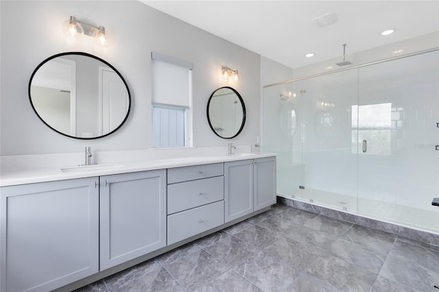 8290 Nemours Pkwy, Orlando, FL 32827 - full bathroom with double vanity, a stall shower, and recessed lighting