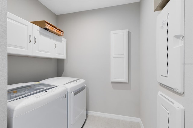 8290 Nemours Pkwy, Orlando, FL 32827 - laundry room featuring cabinet space, washer and clothes dryer, and electric panel