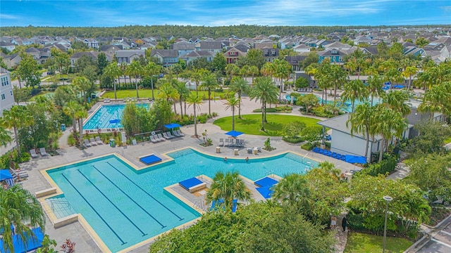 8290 Nemours Pkwy, Orlando, FL 32827 - community pool with a residential view