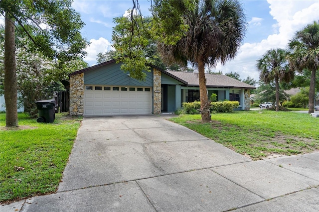 3220 Cardigan Ct, Orlando, FL 32812 - mid-century inspired home with stone siding, an attached garage, a front yard, and concrete driveway