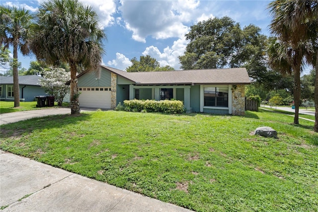 3220 Cardigan Ct, Orlando, FL 32812 - view of front of house featuring stone siding, driveway, a garage, and a front yard