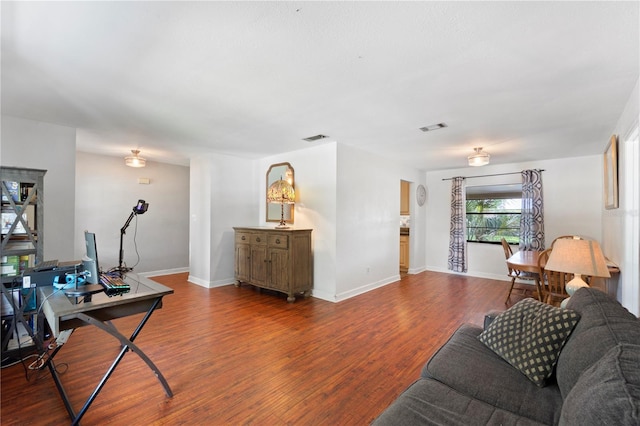 3220 Cardigan Ct, Orlando, FL 32812 - living area with wood finished floors and baseboards