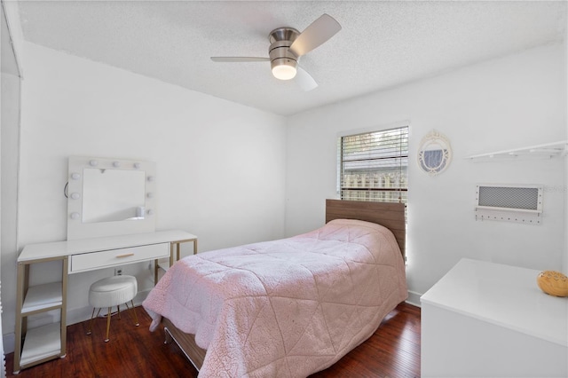 3220 Cardigan Ct, Orlando, FL 32812 - bedroom with wood finished floors, a textured ceiling, and a ceiling fan