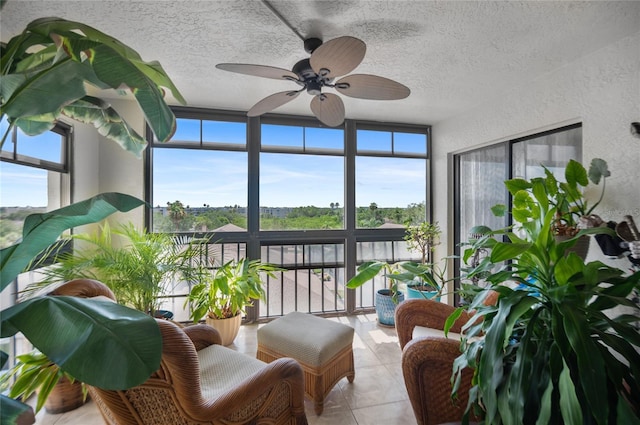 9860 62nd Ter N Unit 1047, Saint Petersburg, FL 33708 - sunroom / solarium featuring expansive windows, a textured ceiling, and a textured wall