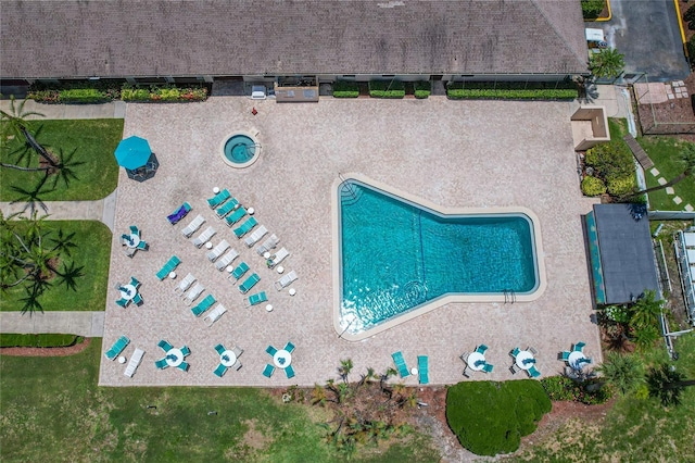 9860 62nd Ter N Unit 1047, Saint Petersburg, FL 33708 - bird's eye view of a pool