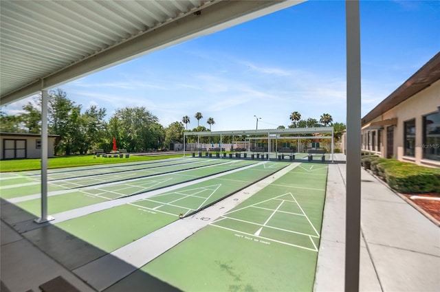 9860 62nd Ter N Unit 1047, Saint Petersburg, FL 33708 - view of property's community featuring shuffleboard