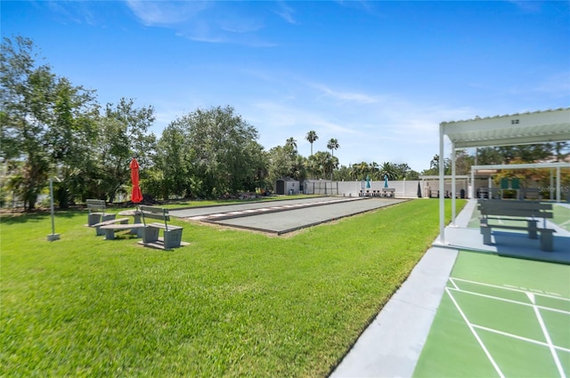 9860 62nd Ter N Unit 1047, Saint Petersburg, FL 33708 - view of community with a game area and shuffleboard