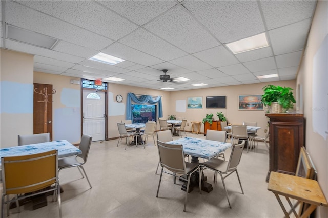 9860 62nd Ter N Unit 1047, Saint Petersburg, FL 33708 - dining room with ceiling fan and a drop ceiling