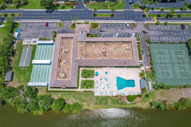 9860 62nd Ter N Unit 1047, Saint Petersburg, FL 33708 - aerial overview of property's location with a pool area and a large body of water