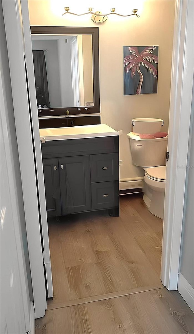 225 S Tropical Trl Unit 402, Merritt Island, FL 32952 - bathroom featuring vanity and baseboards