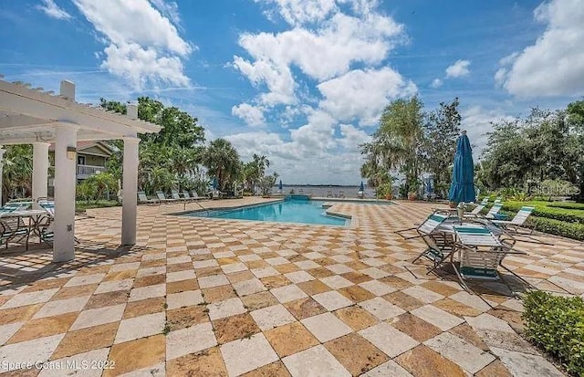 225 S Tropical Trl Unit 402, Merritt Island, FL 32952 - community pool featuring a patio area