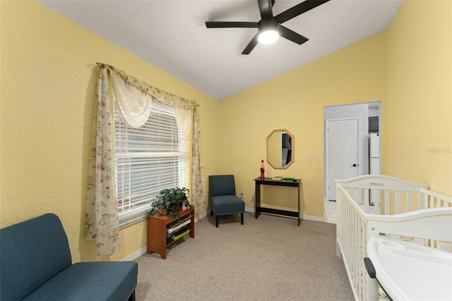 7764 Indian Ridge Trl N, Kissimmee, FL 34747 - carpeted bedroom with vaulted ceiling, multiple windows, freestanding refrigerator, and ceiling fan