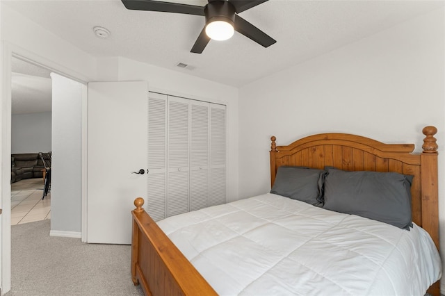 7764 Indian Ridge Trl N, Kissimmee, FL 34747 - bedroom featuring carpet flooring, a closet, and a ceiling fan