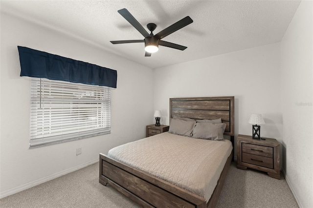 7764 Indian Ridge Trl N, Kissimmee, FL 34747 - carpeted bedroom featuring a textured ceiling and a ceiling fan