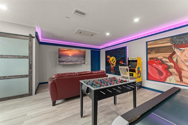 7764 Indian Ridge Trl N, Kissimmee, FL 34747 - playroom with wood finished floors and recessed lighting