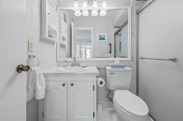 11923 Boynton Ln Unit B, New Port Richey, FL 34654 - bathroom featuring a chandelier, vanity, and tile walls