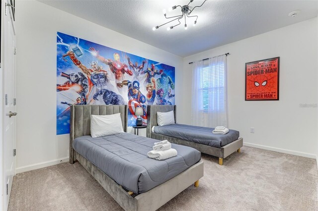 2537 Shanti Dr, Kissimmee, FL 34746 - bedroom with carpet flooring and a textured ceiling