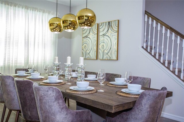 9071 Sunshine Ridge Loop, Kissimmee, FL 34747 - dining room with stairway