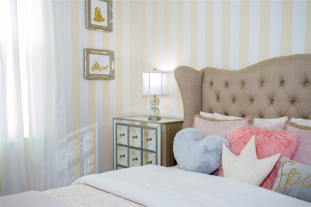 9071 Sunshine Ridge Loop, Kissimmee, FL 34747 - bedroom featuring wallpapered walls