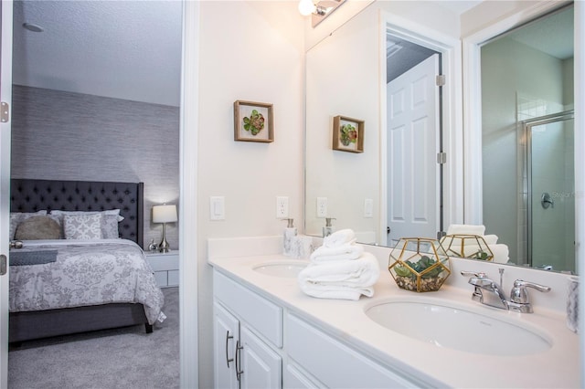 9071 Sunshine Ridge Loop, Kissimmee, FL 34747 - full bath featuring double vanity, a stall shower, and ensuite bath