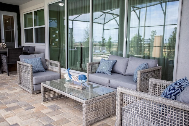 9071 Sunshine Ridge Loop, Kissimmee, FL 34747 - sunroom / solarium with outdoor lounge area