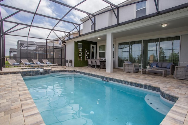 9071 Sunshine Ridge Loop, Kissimmee, FL 34747 - view of pool featuring an outdoor living space, a patio, a lanai, and a pool with connected hot tub