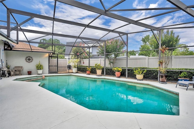 6630 Hidden Beach Cir, Orlando, FL 32819 - view of pool with a patio area and glass enclosure