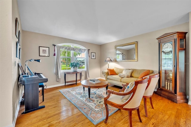 6630 Hidden Beach Cir, Orlando, FL 32819 - living area with light wood-style floors and baseboards