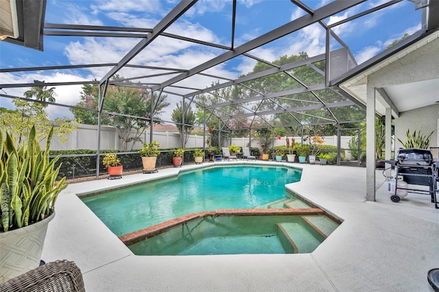 6630 Hidden Beach Cir, Orlando, FL 32819 - view of swimming pool with a patio, a fenced backyard, a pool with connected hot tub, and a grill