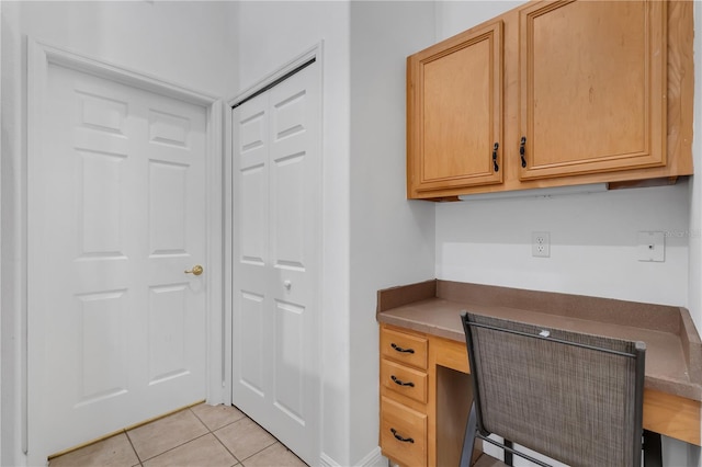 12713 Pine Arbor Dr, Clermont, FL 34711 - unfurnished office featuring light tile patterned floors and built in desk