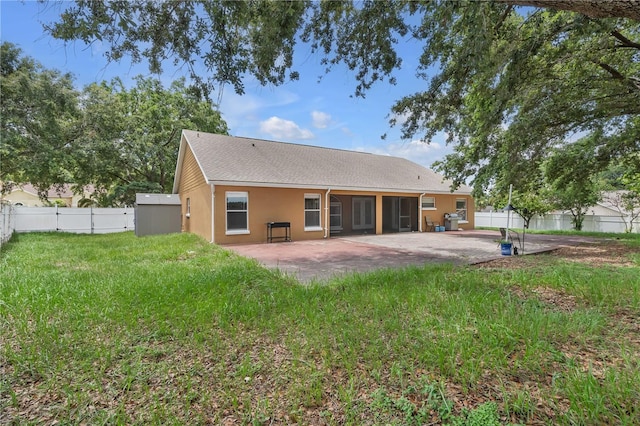 12713 Pine Arbor Dr, Clermont, FL 34711 - rear view of property featuring a patio, stucco siding, and roof with shingles