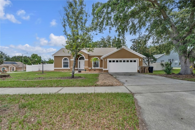 12713 Pine Arbor Dr, Clermont, FL 34711 - ranch-style home featuring stucco siding, a garage, and driveway