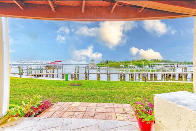 150 Brent Cir, Oldsmar, FL 34677 - view of grassy yard with boat lift, a dock, and a water view
