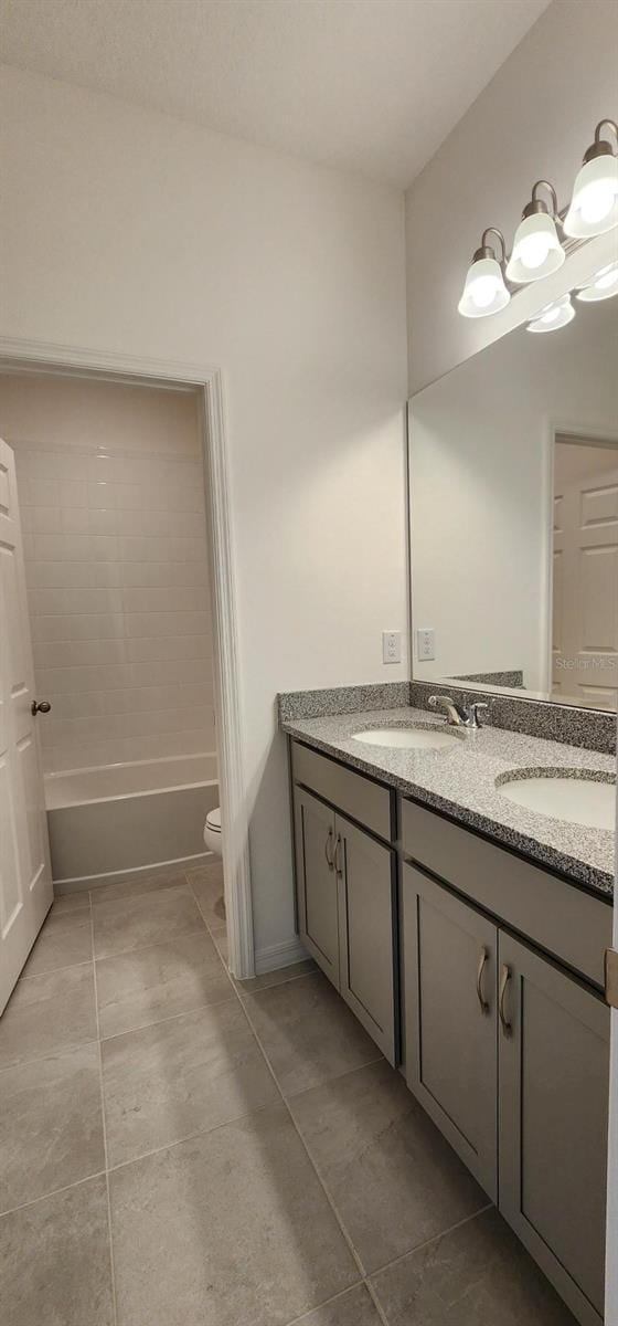483 Shadow Gorge Way, Eustis, FL 32736 - bathroom with double vanity and tile patterned floors