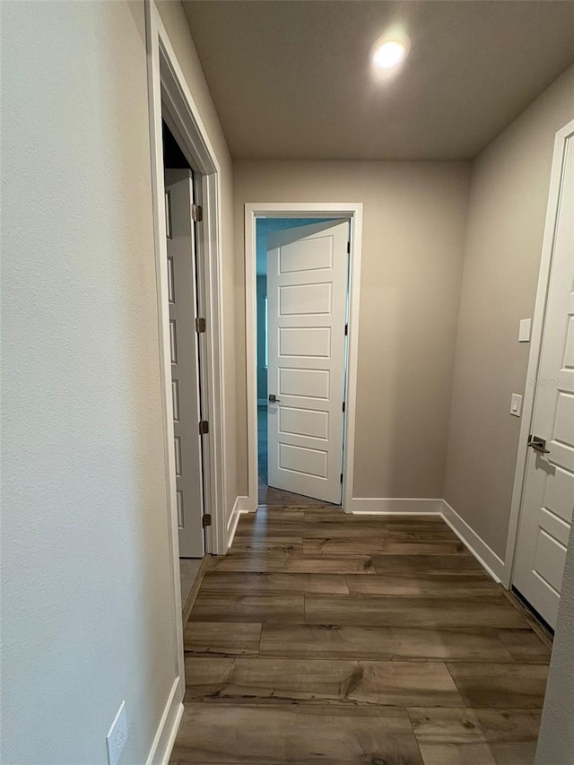 2318 Raven Ridge Rd, Minneola, FL 34715 - hallway featuring dark wood-style flooring and recessed lighting