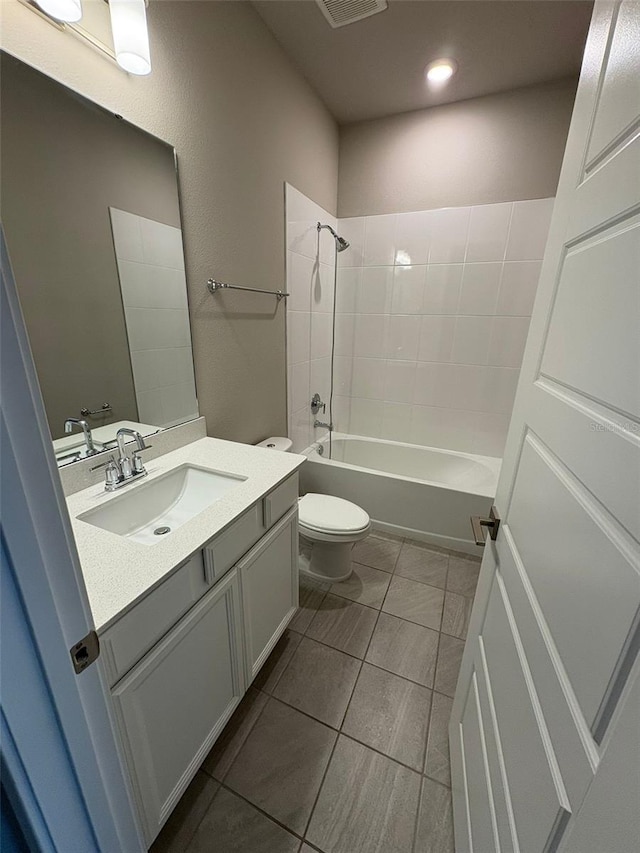 2318 Raven Ridge Rd, Minneola, FL 34715 - bathroom featuring vanity, bathtub / shower combination, recessed lighting, and tile patterned flooring