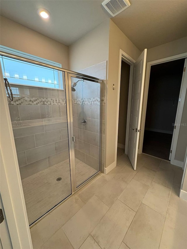 2318 Raven Ridge Rd, Minneola, FL 34715 - bathroom with a shower stall, recessed lighting, and tile patterned flooring