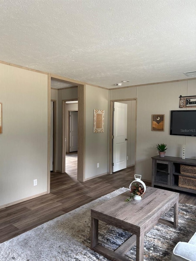 1349NW 109th Ave, Ocala, FL 34482 - living room with a textured ceiling, wood finished floors, and crown molding