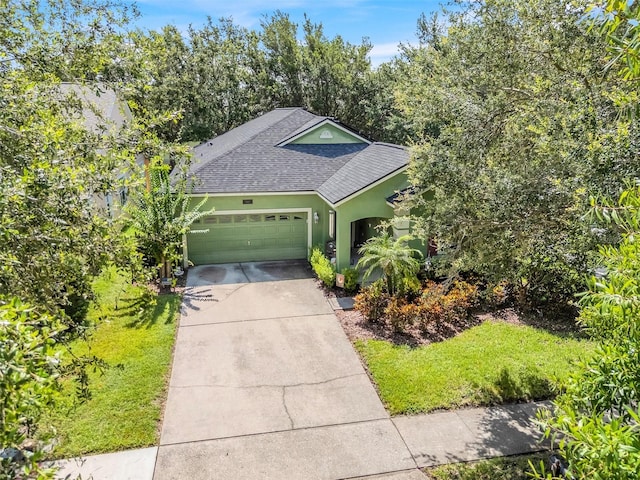 5263 Beach River Rd, Windermere, FL 34786 - single story home with roof with shingles, driveway, an attached garage, and stucco siding