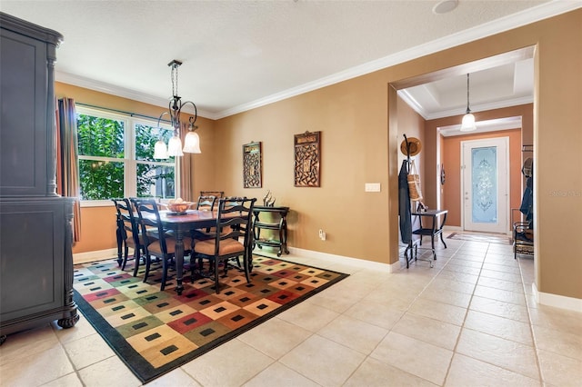 5263 Beach River Rd, Windermere, FL 34786 - dining area with ornamental molding and light tile patterned floors
