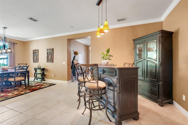5263 Beach River Rd, Windermere, FL 34786 - bar area with ornamental molding, light tile patterned flooring, decorative light fixtures, and a chandelier