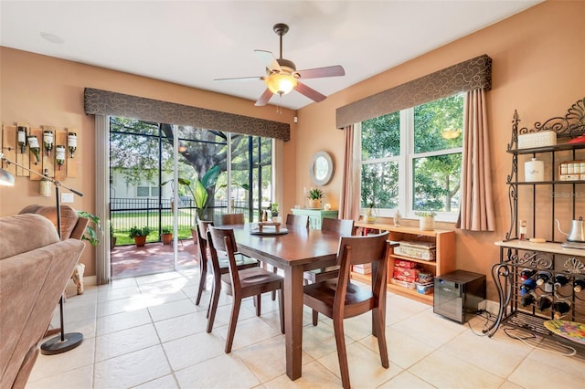 5263 Beach River Rd, Windermere, FL 34786 - dining space with healthy amount of natural light, ceiling fan, and light tile patterned flooring