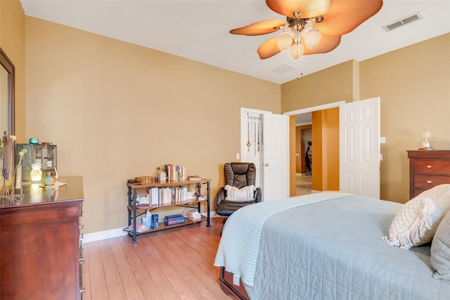 5263 Beach River Rd, Windermere, FL 34786 - bedroom with light wood-type flooring and ceiling fan