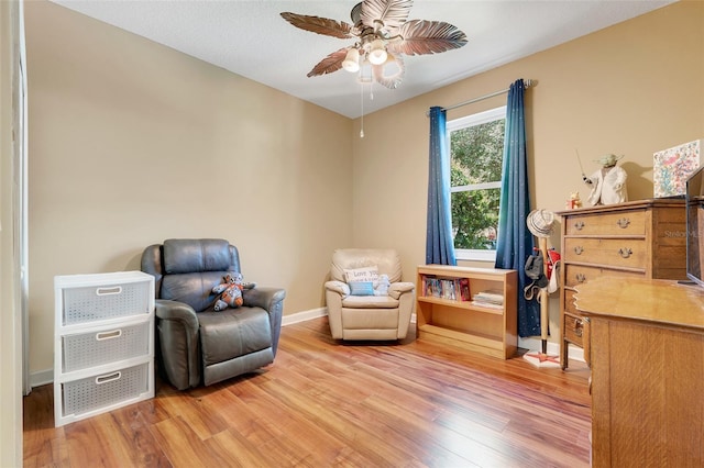 5263 Beach River Rd, Windermere, FL 34786 - sitting room featuring light wood-type flooring and ceiling fan